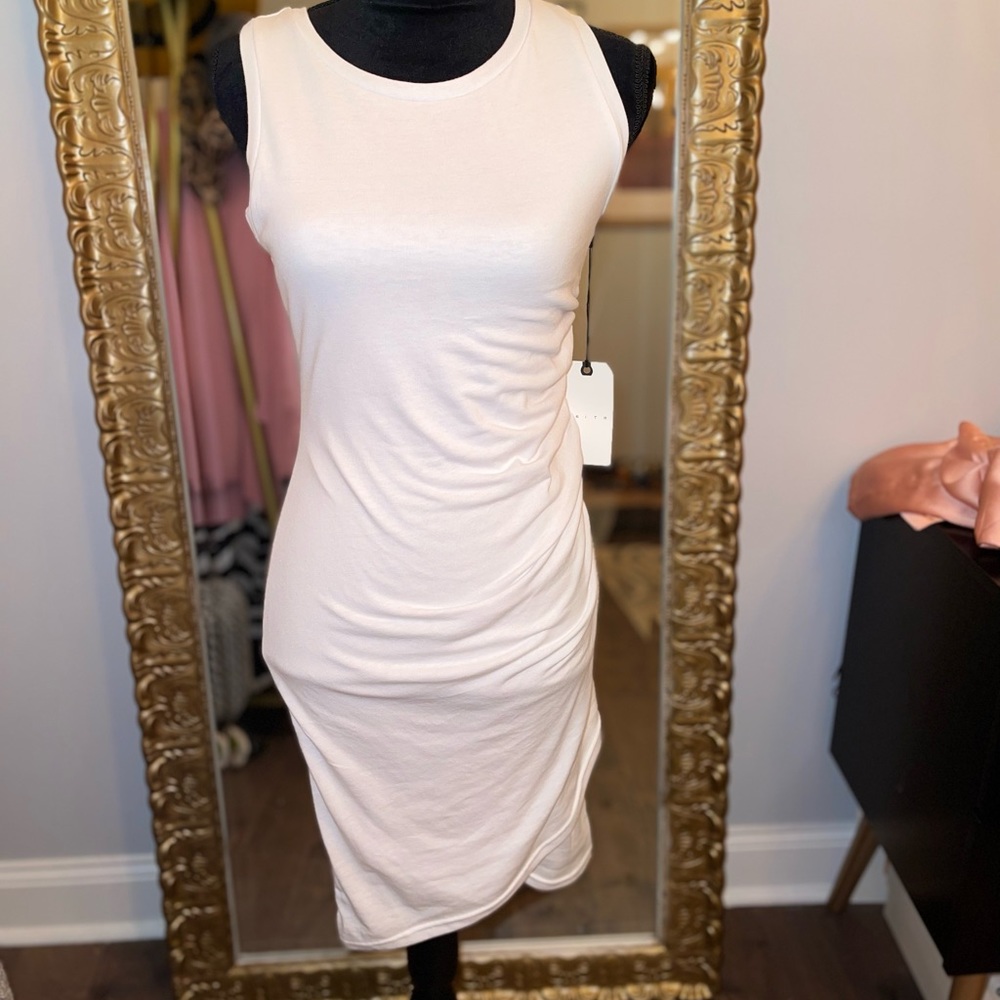 Super cute white shirt dress with side ruching. Size M